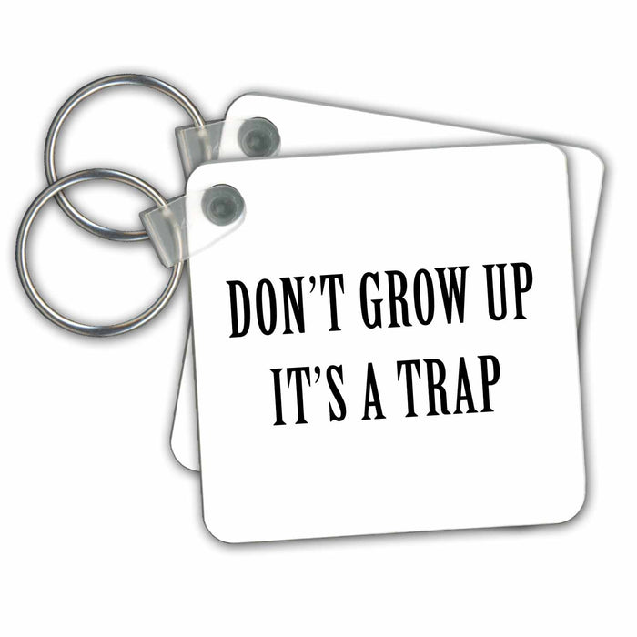 set of 2 Key Chains - DONT GROW UP ITS A TRAP Anne Collections Quotes