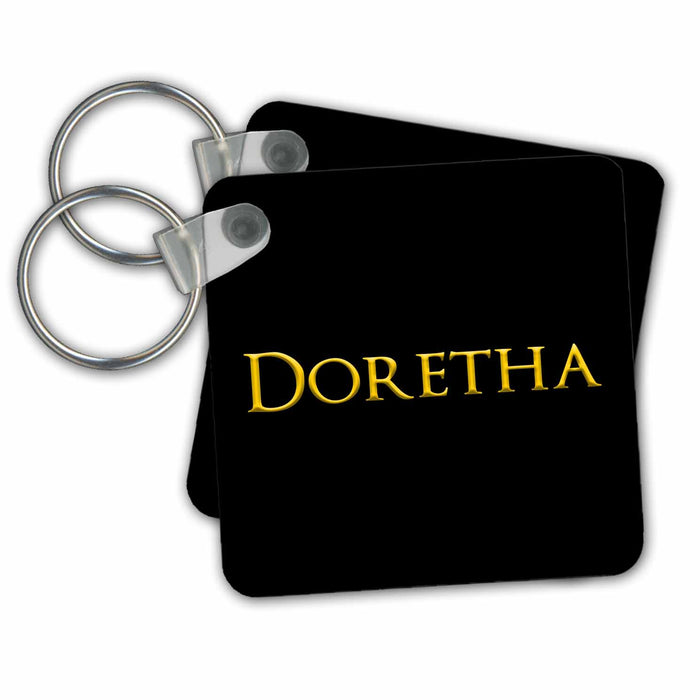 Key Chain - Doretha common girl baby name in the USA. Yellow on black talisman Alexis Design - Popular Female Names in USA