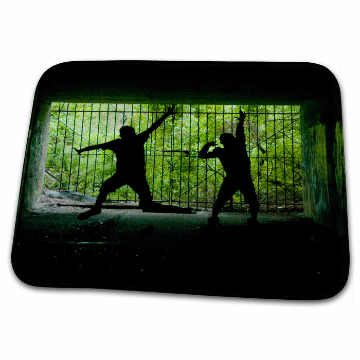 Dish Drying Mat - 2 boys jumping in a tunnel with bars and green bushes in the background Photography