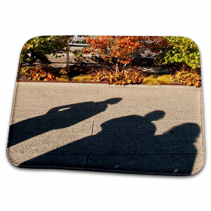 Dish Drying Mat - shadows of 3 people on the sidewalk, plants nearby Photography